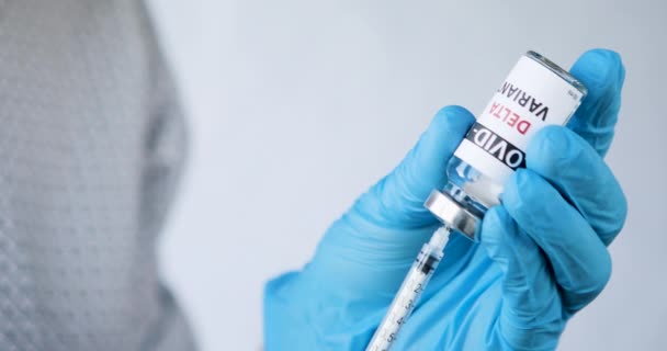 Frascos de vacunas covid - 19 variante delta — Vídeos de Stock