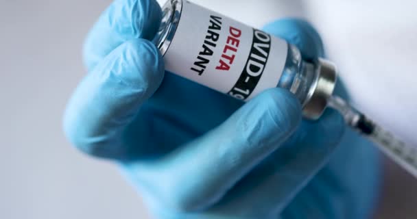 Frascos de vacina covid - 19 delta variante — Vídeo de Stock