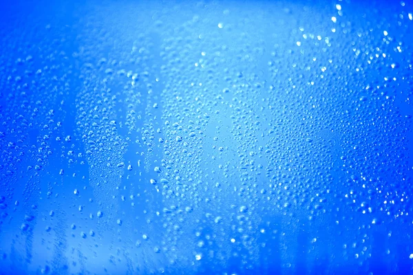 Krople wody na streszczenie tło — Zdjęcie stockowe