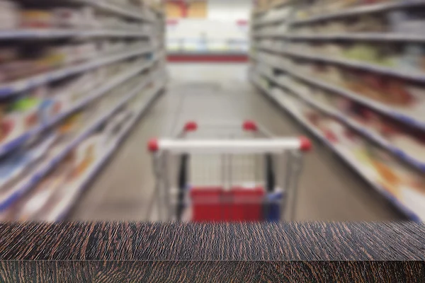 Zwarte tabel in een supermarkt lege ruimte — Stockfoto