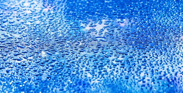 Gotas de agua sobre fondo abstracto — Foto de Stock