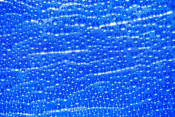 Water drops on abstract background — Stock Photo, Image