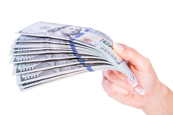 Muitos dólares caindo em mulheres mão com dinheiro — Fotografia de Stock