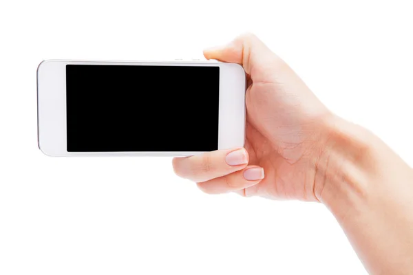 Mano che tiene Smartphone bianco con schermo bianco su backgro bianco — Foto Stock