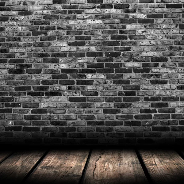 Lightwood textured backgrounds in a room interior on the brick b Royalty Free Stock Images