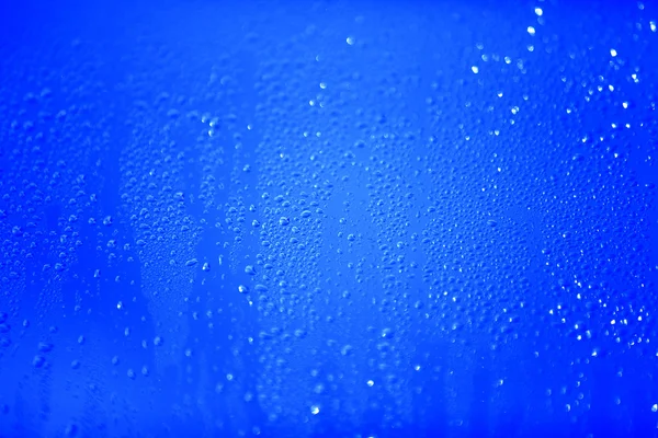Gotas de agua sobre fondo abstracto — Foto de Stock