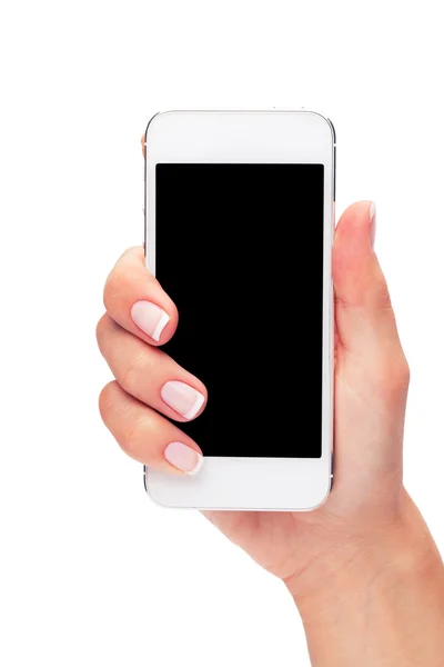 Рука тримає білий смартфон з порожнім екраном на білому фоні — стокове фото