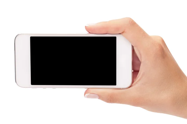 Рука держа белый смартфон с пустым экраном на белом backgro — стоковое фото