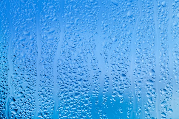 Краплі води на абстрактному фоні — стокове фото
