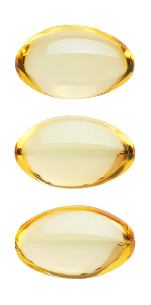 Yellow pills on white — Stock Photo, Image