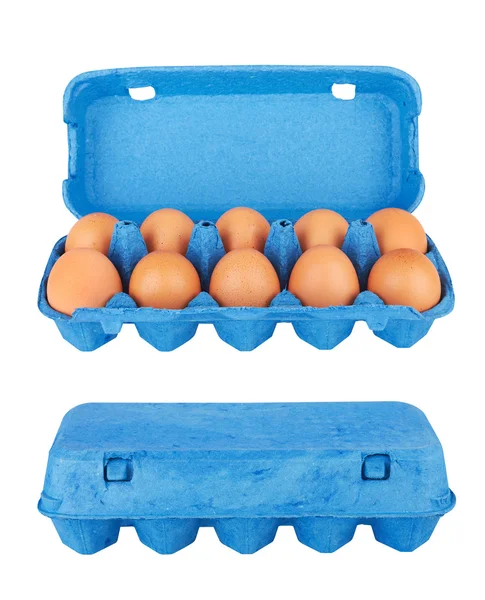 Cardboard egg box with eggs — Stock Photo, Image