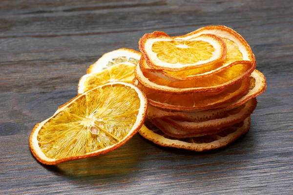 Αποξηραμένες Φέτες Πορτοκαλιού Ξύλινο Φόντο — Φωτογραφία Αρχείου