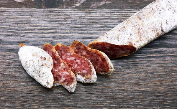 Salami Close Slices Wooden Background — Stock Photo, Image