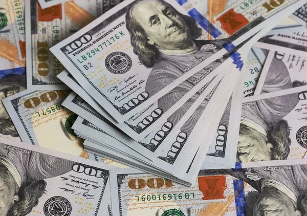 Achtergrond dollarbiljetten close-up — Stockfoto