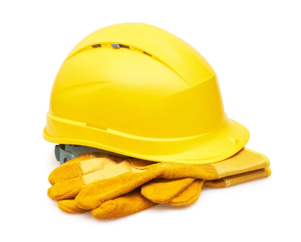 Yellow safety helmet and Protective gloves — Stock Photo, Image