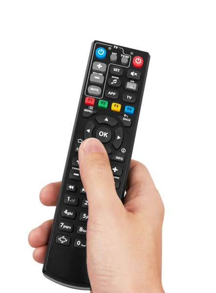 Remote control in hand — Stock Photo, Image