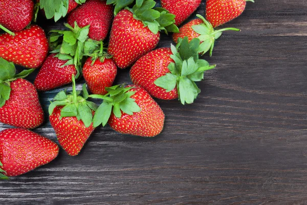 Strawberries on a wood — Stock Photo, Image