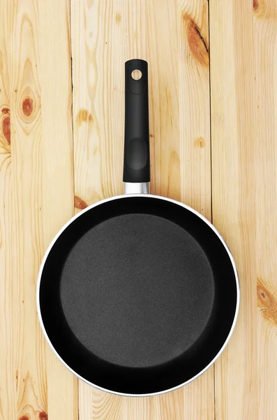 Pan on wood — Stock Photo, Image