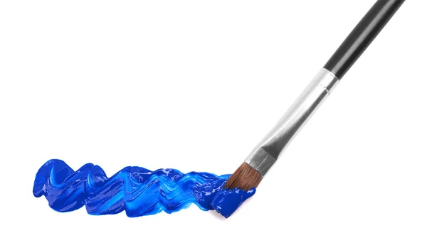 Pincel con pintura azul — Foto de Stock