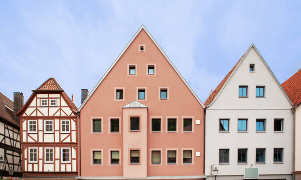 Facades of houses in a European town. German architectural style.