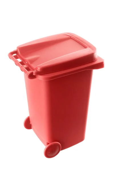 Plastic red trash can isolated on white background Stock Image