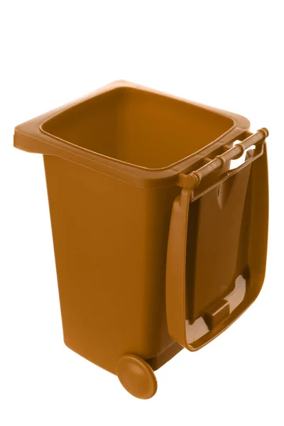 Пластиковый коричневый мусорный бак на белом фоне Лицензионные Стоковые Фото