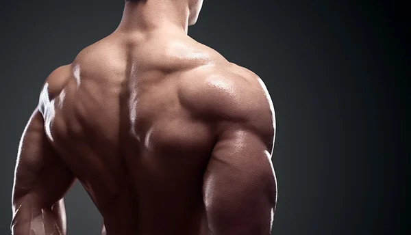 Muscled male model showing his back — Stock Photo, Image