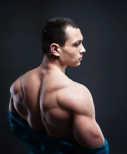 Muscled male model showing his back — Stock Photo, Image