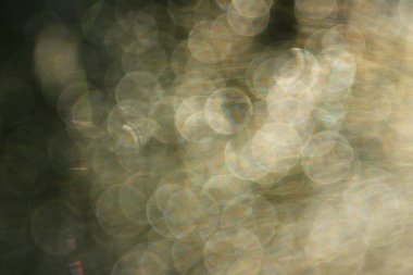 Arka plan. Işık geçiş, mercek parlaması, ışık sızıntıları, bindirmeleri, bokeh.