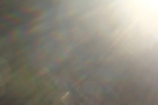 Arka plan. Işık geçiş, mercek parlaması, ışık sızıntıları, bindirmeleri, bokeh.