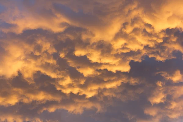 Bright and dark clouds looks like enigmatic figures in sky — Stock Photo, Image