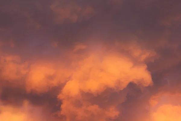 Bright and dark clouds looks like enigmatic figures in sky — Stock Photo, Image