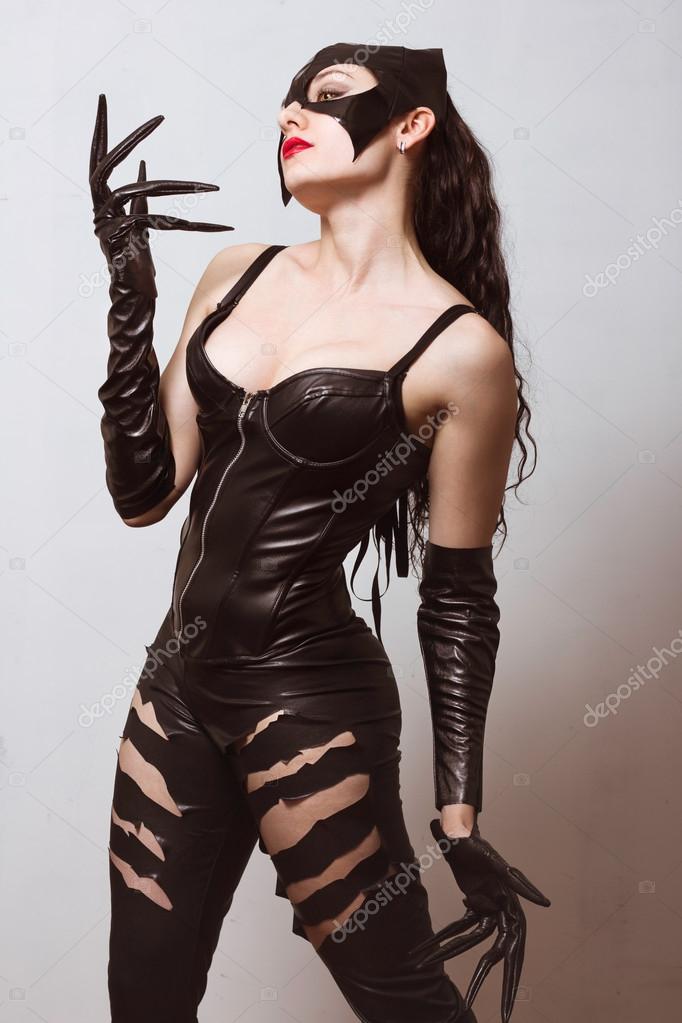Animation style attractive woman in leather latex cat costume Stock Photo  by ©belovodchenko 77179121