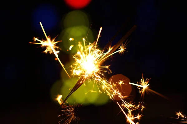 Fundo de férias com um sparkler — Fotografia de Stock