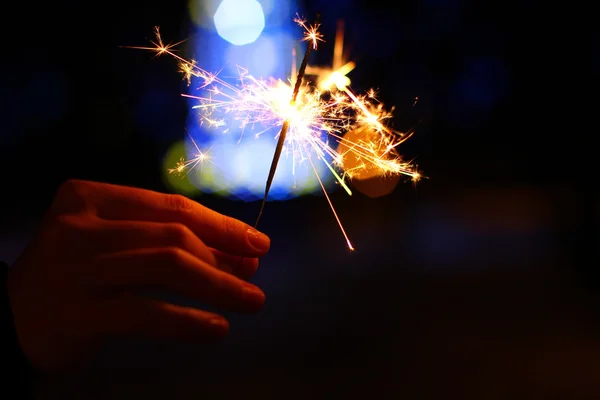 Fundo de férias com um sparkler — Fotografia de Stock