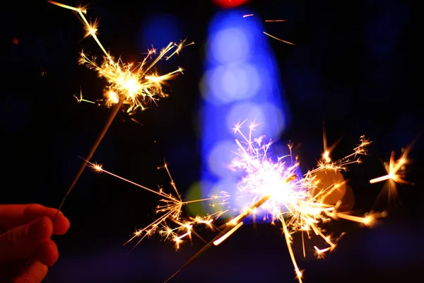 Fundo de férias com um sparkler — Fotografia de Stock