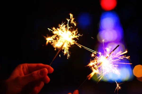 Fundo de férias com um sparkler — Fotografia de Stock