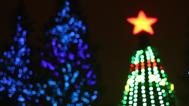 Abstract circulaire bokeh achtergrond van kerstboom licht — Stockvideo