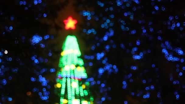 Abstract circulaire bokeh achtergrond van kerstboom licht — Stockvideo