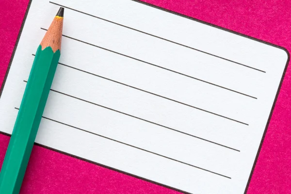 Exercise book name label and pencil — Stock Photo, Image