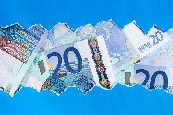 Euro in zerrissenen Blaubuch frame — Stockfoto