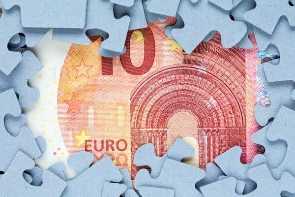 Puzzle-Rahmen mit zehn Euro Schein — Stockfoto