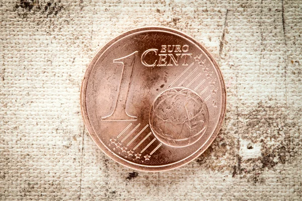 One Euro cent on old canvas — Stock Photo, Image