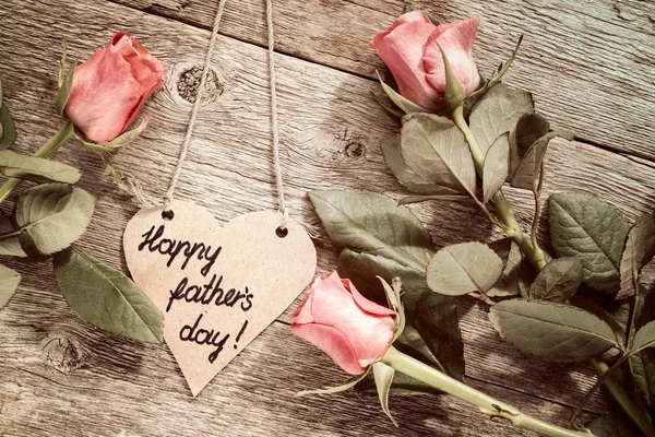 Heart shaped fathers day card with roses — Stock Photo, Image