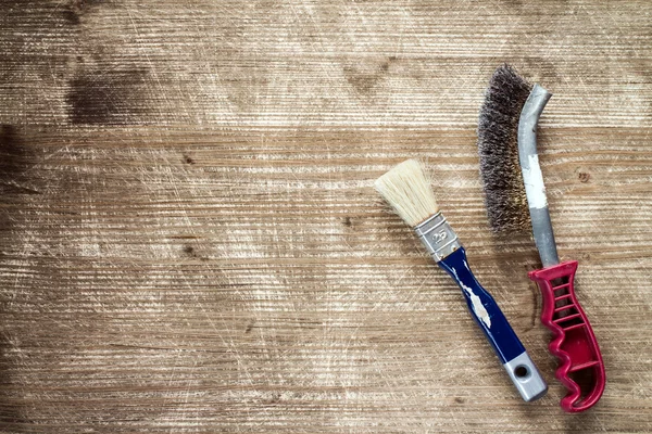 Paintbrush and wire brush — Stock Photo, Image