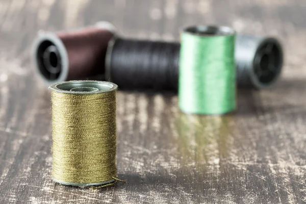 Bobbins with threads — Stock Photo, Image