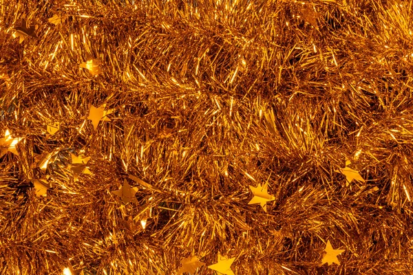 Scattered Shiny Festive Tinsel Golden Color Celebratory Christmas Gold Texture — Stock Photo, Image