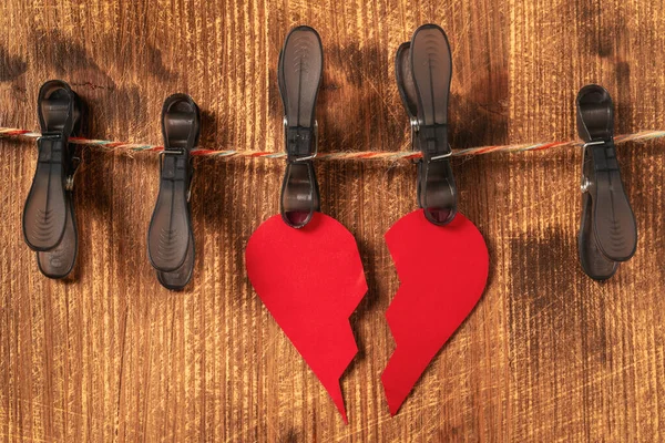 Broken Paper Heart Hangs Clothespins Wooden Background — Stock Photo, Image