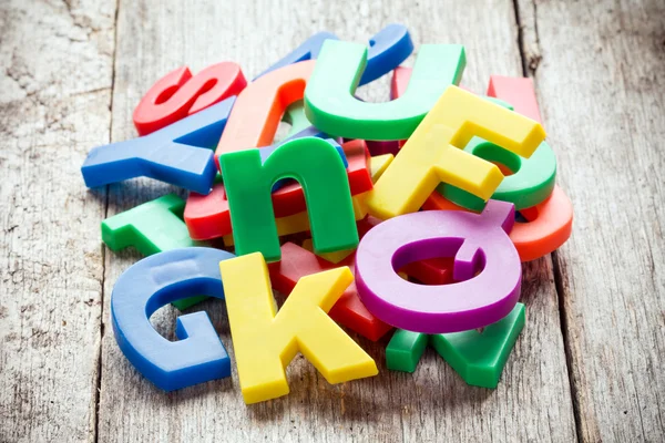 Pile of colorful plastic letters — Stock Photo, Image