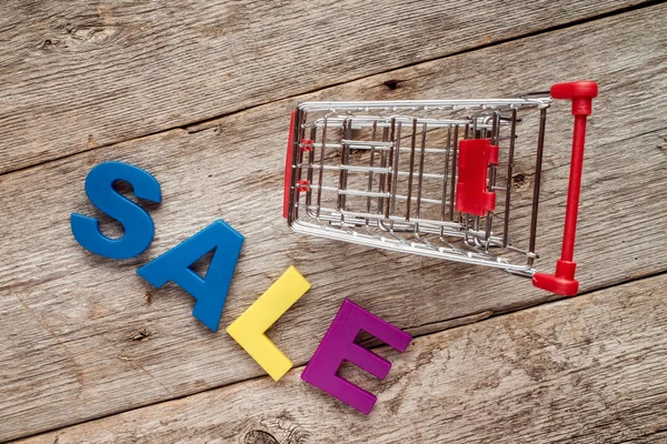 Carrito de la compra y venta de ortografía de letras — Foto de Stock